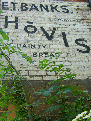 Painted wall advertisement for Hovis bread, in Harrietsham village