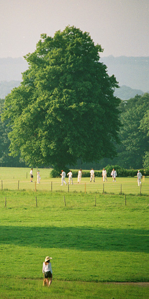 Cricket match in the grounds of Leeds Castle, Kent