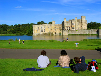 Tea break at Leeds Castle, with view of castle, moat, and grounds