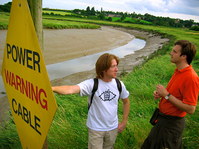 Roman River and power cable warning sign