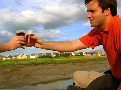 Beers on the riverbank at Rowhedge village